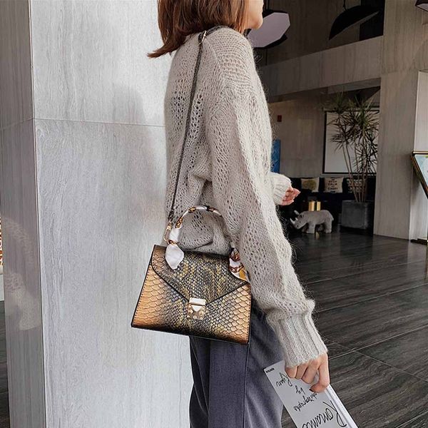 серпантин crossbody сумки дамы женщин 2019 новый прочный змея pattern портативный сумка мода плеча сумка borsa donna
серпантин crossbody сумки дамы женщин 2019 новый прочный змея pattern портативный сумка мода плеча сумка borsa donna