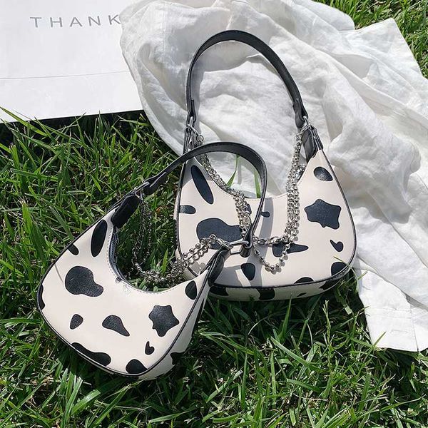 fashion cow pattern women shoulder bags designer mini chains handbags luxury leather messenger bag lady half moon small purses
fashion cow pattern women shoulder bags designer mini chains handbags luxury leather messenger bag lady half moon small purses