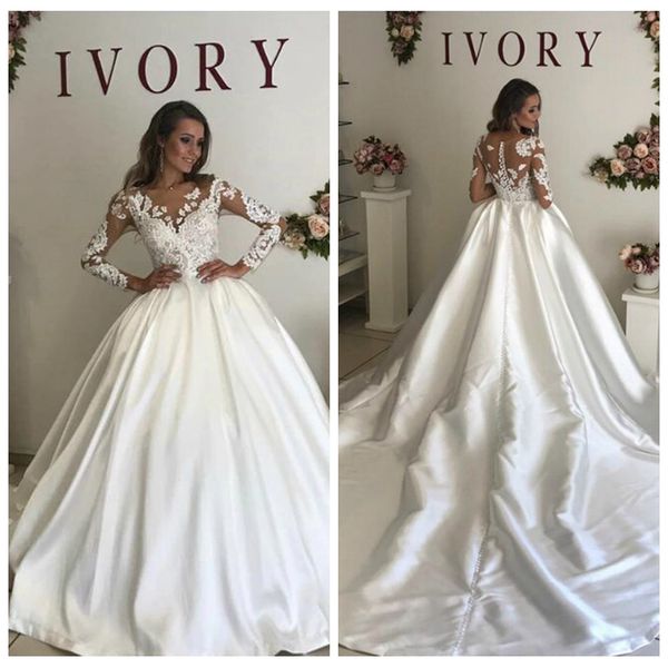 charming lace long sleeve wedding dress ball gown court train lace appliques see through wedding dress sheer back voiles de mariage, White
charming lace long sleeve wedding dress ball gown court train lace appliques see through wedding dress sheer back voiles de mariage, White