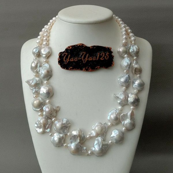 19" 2 rows cultured white flower keshi pearl necklace, Silver
19" 2 rows cultured white flower keshi pearl necklace, Silver
