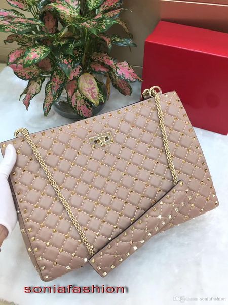 new fashion woman bag designer genuine leather with rivet have chain strap lady big shoulder woman bag
new fashion woman bag designer genuine leather with rivet have chain strap lady big shoulder woman bag