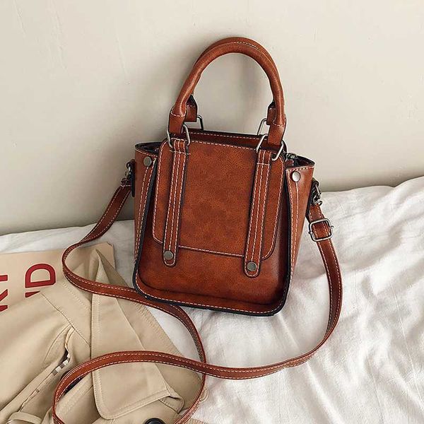 new women small handbags vintage casual tote shoulder messenger bags belt rivet mini purse hand bag brown
new women small handbags vintage casual tote shoulder messenger bags belt rivet mini purse hand bag brown