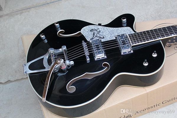 black semi-hollow electric guitar with chrome hardware, tremolo system, white bingding, personalized service
black semi-hollow electric guitar with chrome hardware, tremolo system, white bingding, personalized service