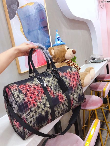 2020 men duffle bag women travel bags hand luggage luxury designer travel bag men pu leather handbags large cross body bag totes 46cm
2020 men duffle bag women travel bags hand luggage luxury designer travel bag men pu leather handbags large cross body bag totes 46cm