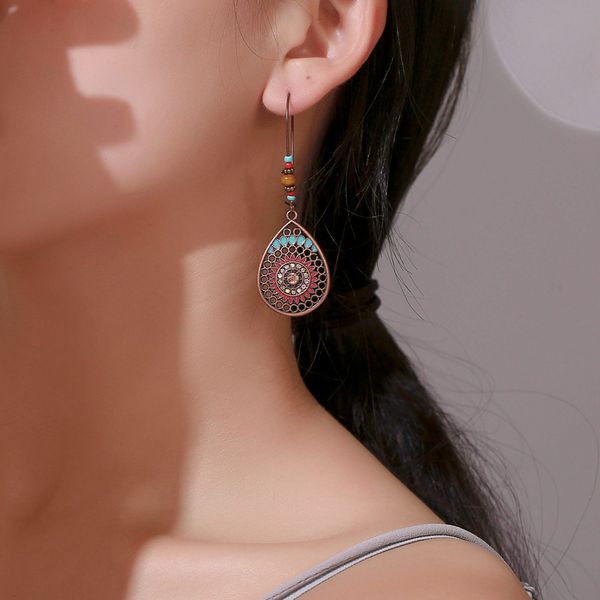 bohemian ethnic style plant dangle earrings ancient silver hollow carving shell earring women zircon beads leaf water drop ear hook accessor
bohemian ethnic style plant dangle earrings ancient silver hollow carving shell earring women zircon beads leaf water drop ear hook accessor