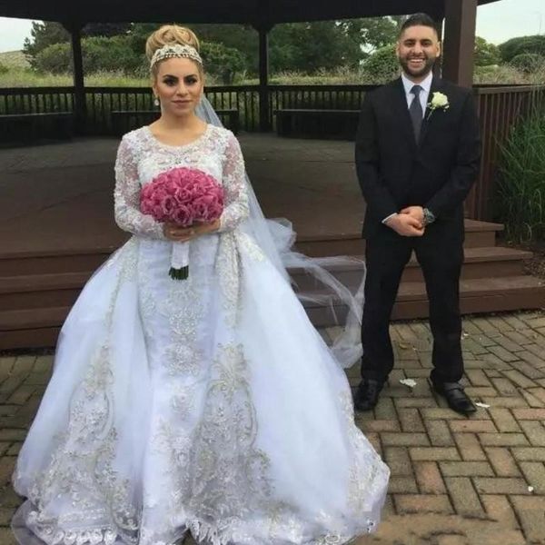 Luxury Long Sleeves Wedding Dresses With Detachable Train Jewel Illusion Bridal Gowns Crystals Sequins Overskirts Lace Wedding Dress Mermaid
Luxury Long Sleeves Wedding Dresses With Detachable Train Jewel Illusion Bridal Gowns Crystals Sequins Overskirts Lace Wedding Dress Mermaid