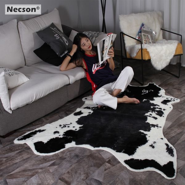 black and white cowhide rug printed faux skin cow striped hair carpet for model selfie lliving bed room villi doormat mat k34
black and white cowhide rug printed faux skin cow striped hair carpet for model selfie lliving bed room villi doormat mat k34