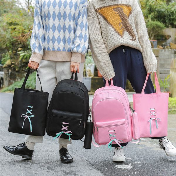 new fashion bow streamers in college women's backpacks canvas multi-layer korean version of the backpack to send shopping bags
new fashion bow streamers in college women's backpacks canvas multi-layer korean version of the backpack to send shopping bags