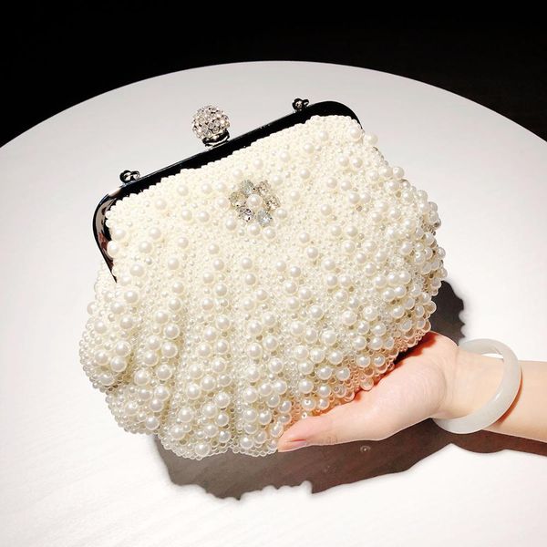 2019 new shell pearl bag evening bag dress banquet clutch female fairy portable diagonal small
2019 new shell pearl bag evening bag dress banquet clutch female fairy portable diagonal small