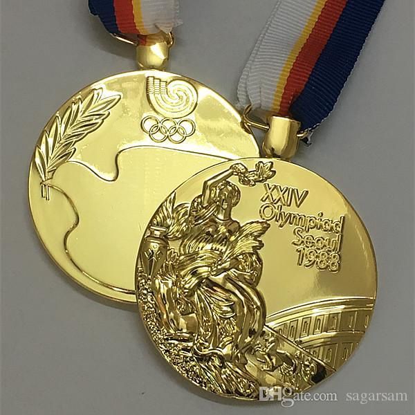 100 pcs new arrival the 1988 korea seoul xxiv olympic game gold medal sport collectible award badge with ribbon ing 
100 pcs new arrival the 1988 korea seoul xxiv olympic game gold medal sport collectible award badge with ribbon ing