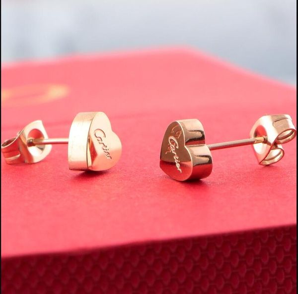new cartier heart rose gold titanium steel stud earrings stereo love letter earrings heart stud earrings with original box, Golden;silver
new cartier heart rose gold titanium steel stud earrings stereo love letter earrings heart stud earrings with original box, Golden;silver