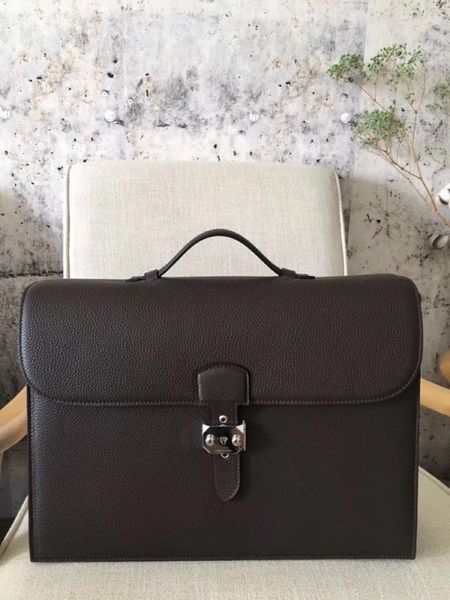 original handmade with wax thread deep brown design brief case,togo skin both gold,sliver hardware for chosen
original handmade with wax thread deep brown design brief case,togo skin both gold,sliver hardware for chosen