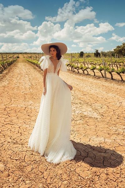 a-line wedding dresses deep v neck cap sleeves backless wedding gowns elegant bride dress classic white point long dress abito da sposa
a-line wedding dresses deep v neck cap sleeves backless wedding gowns elegant bride dress classic white point long dress abito da sposa