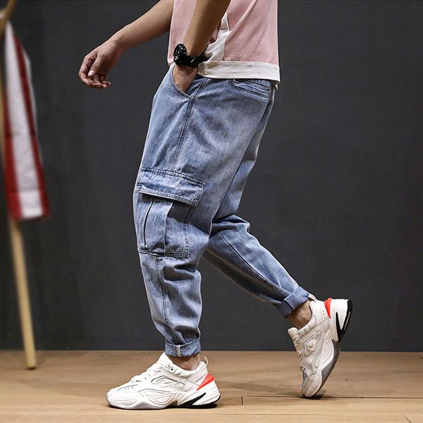 japanese style fashion men jeans blue loose fit big pocket harem pants wide leg streetwear hip hop jeans men taper trousers 
japanese style fashion men jeans blue loose fit big pocket harem pants wide leg streetwear hip hop jeans men taper trousers