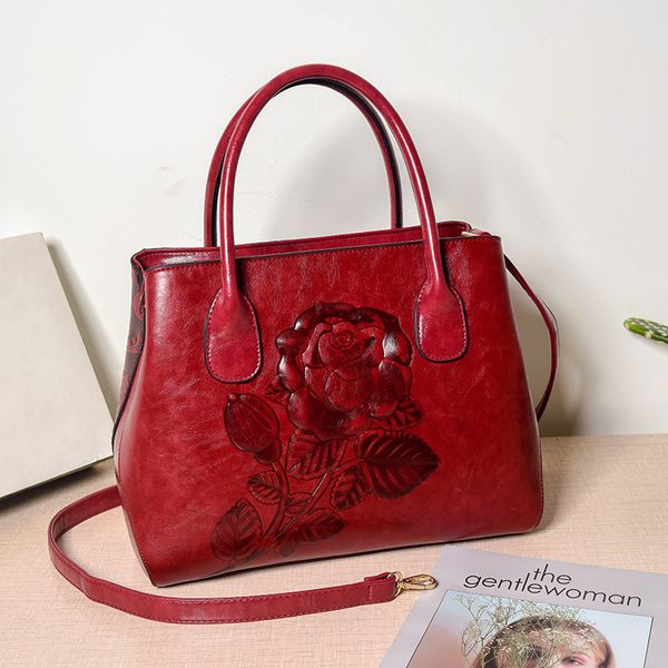 2020 новая мода стиль этнический плеча сумка трехмерная роза рука резной кожи сумочка
2020 новая мода стиль этнический плеча сумка трехмерная роза рука резной кожи сумочка