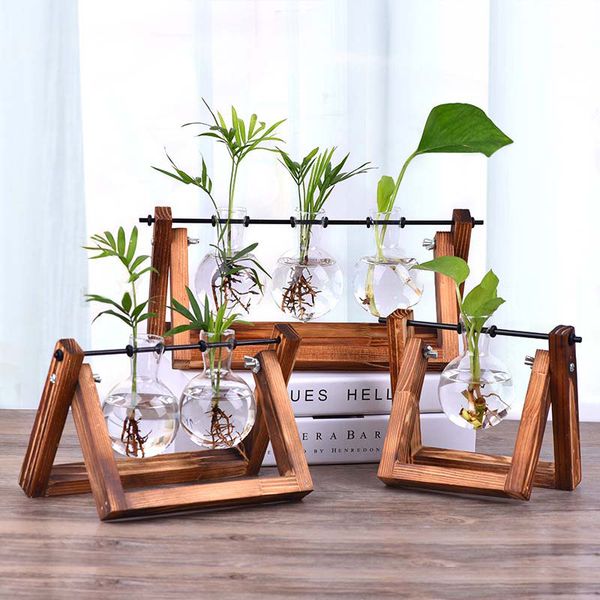vintage creative hydroponic plant transparent vase wooden frame coffee shop room glass tableplant bonsai home decor flower vase
vintage creative hydroponic plant transparent vase wooden frame coffee shop room glass tableplant bonsai home decor flower vase