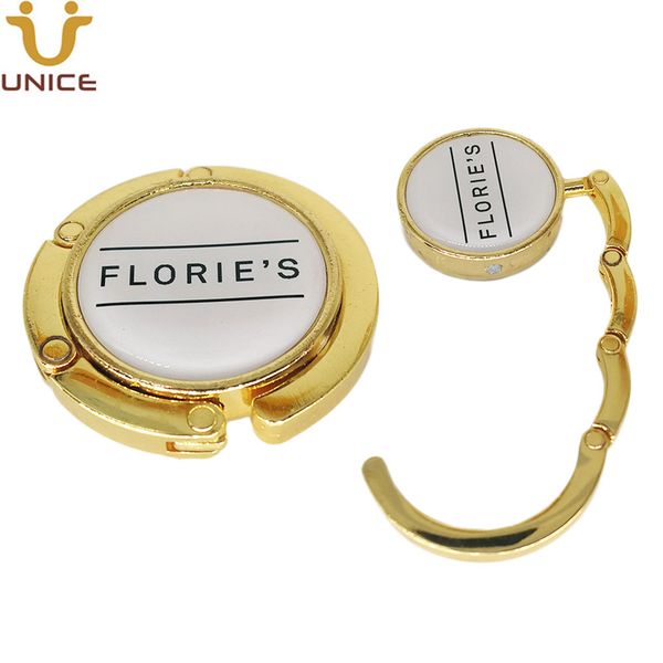 moq 100pcs customized logo gold bag hanger no mirror folding hook lady purse holder table wedding anniversary gift
moq 100pcs customized logo gold bag hanger no mirror folding hook lady purse holder table wedding anniversary gift