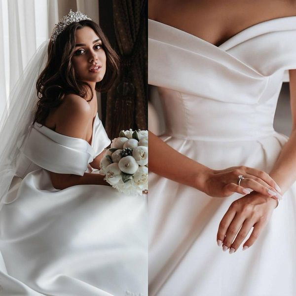 custom made elegant ivory satin wedding dresses 2020 a line satin bridal gowns off the shoulder wedding gowns veil vestido de novia, White
custom made elegant ivory satin wedding dresses 2020 a line satin bridal gowns off the shoulder wedding gowns veil vestido de novia, White