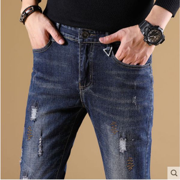 the blue jeans male wind han edition cultivate one's morality and feet tide hole in men's trousers
the blue jeans male wind han edition cultivate one's morality and feet tide hole in men's trousers