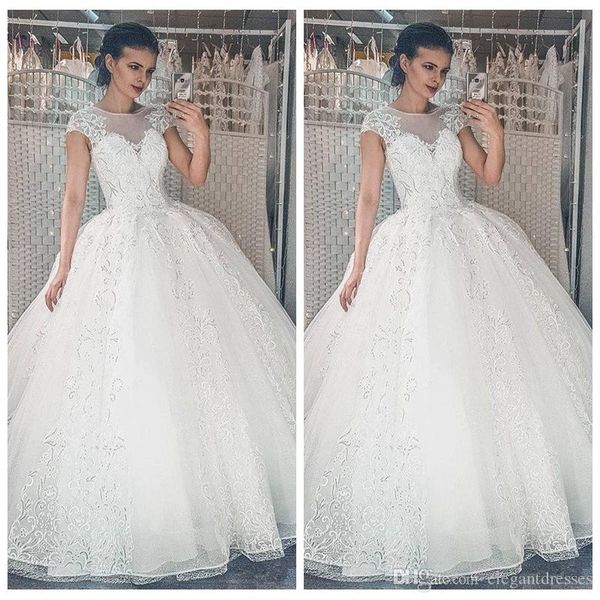 elegant white sheer lace appliques wedding dresses a-line short sleeves long bridal gowns modest largo robe de mariee princess plus size
elegant white sheer lace appliques wedding dresses a-line short sleeves long bridal gowns modest largo robe de mariee princess plus size
