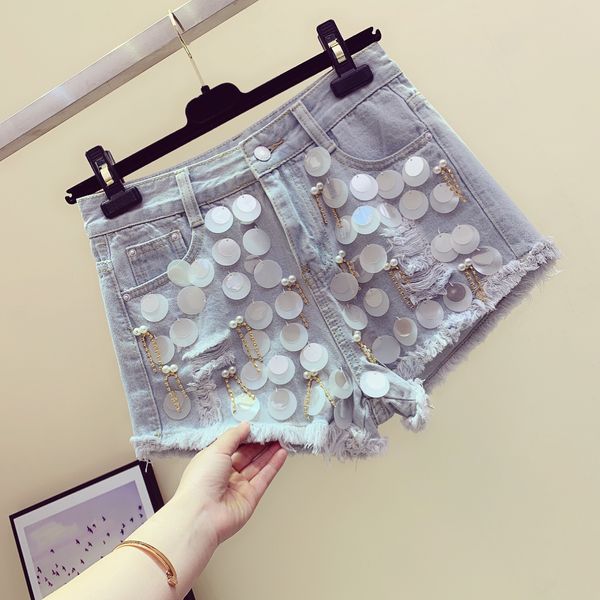 spring summer new hand-studded beaded sequined chain ripped denim shorts women's wild fur trim wide-leg shorts jean short mujer, Blue
spring summer new hand-studded beaded sequined chain ripped denim shorts women's wild fur trim wide-leg shorts jean short mujer, Blue