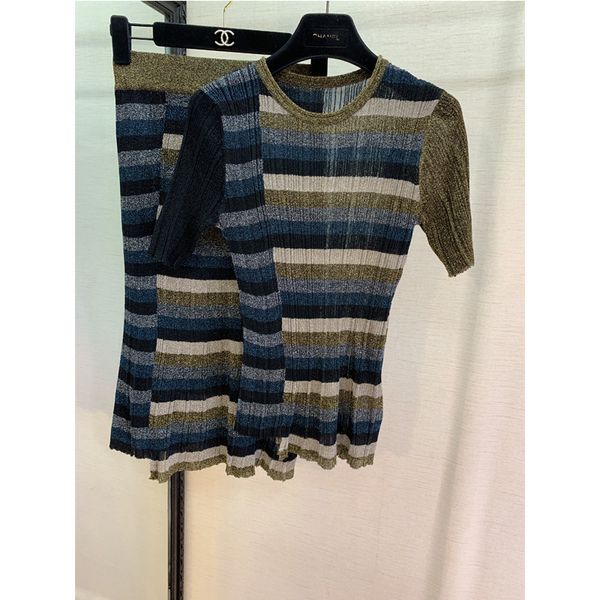 fashion casual women knitted plaid color suit short sleeves with half skirt suit, White
fashion casual women knitted plaid color suit short sleeves with half skirt suit, White