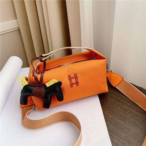 women's new oxford simple embroidery pillow bag fashion brand personality design shoulder bag ladies cute pony pendant hand
women's new oxford simple embroidery pillow bag fashion brand personality design shoulder bag ladies cute pony pendant hand