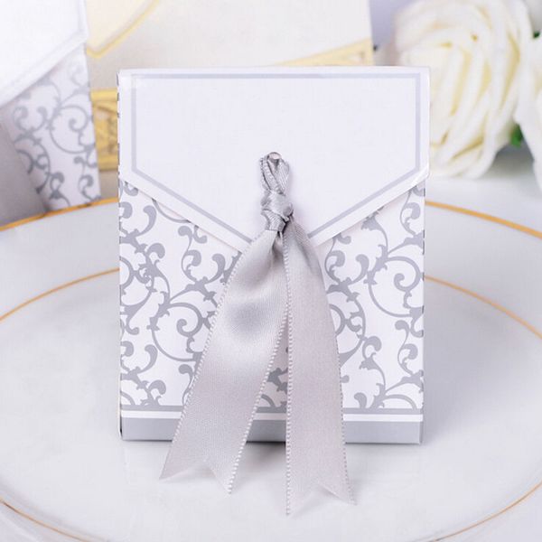new 10pcs creative golden silver ribbon wedding favours party gift candy paper box
new 10pcs creative golden silver ribbon wedding favours party gift candy paper box