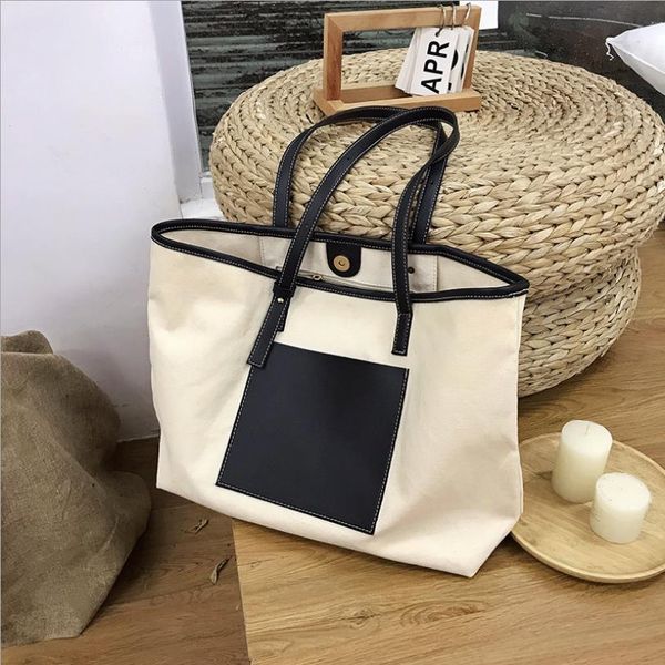 design new type of minimalist pu splicing canvas shoulder big bag for women's handbag female portable and versatile commuter tote
design new type of minimalist pu splicing canvas shoulder big bag for women's handbag female portable and versatile commuter tote