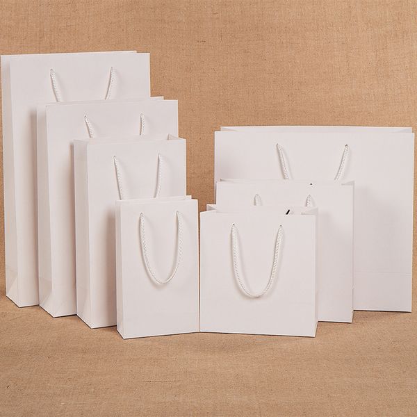 10 pcs/lot gift bags for clothes books packaging paper box bags kraft paper gift bag with handles high-end white
10 pcs/lot gift bags for clothes books packaging paper box bags kraft paper gift bag with handles high-end white