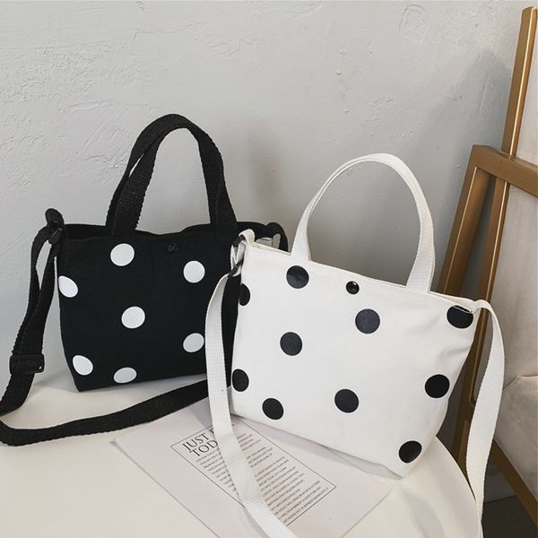 2020 new style children polka dot canvas crossbody bag simple versatile hand handbag girls lightweight oblique bag
2020 new style children polka dot canvas crossbody bag simple versatile hand handbag girls lightweight oblique bag