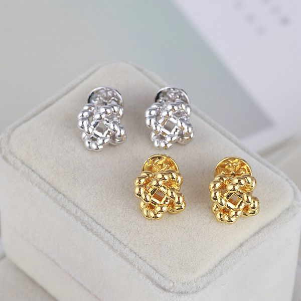real gold/silver plated twist style stud earrings popular brand letter earrings, Golden;silver
real gold/silver plated twist style stud earrings popular brand letter earrings, Golden;silver