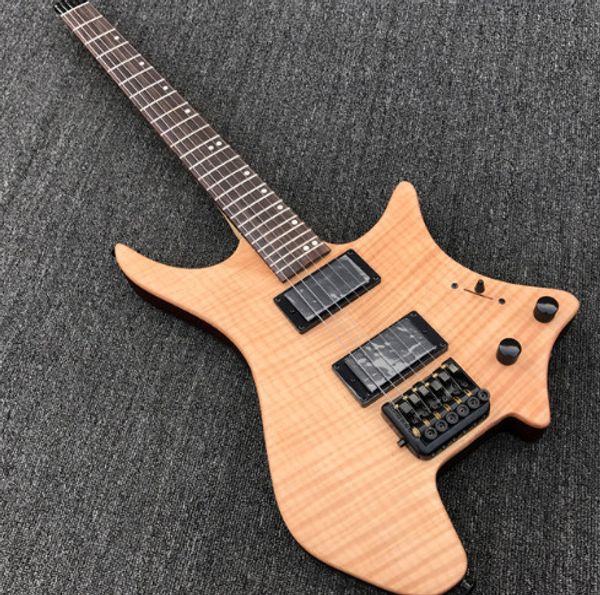 Grote new tyle headle electric guitar in atin fini h natural color flame maple black hardware real photo howing
Grote new tyle headle electric guitar in atin fini h natural color flame maple black hardware real photo howing