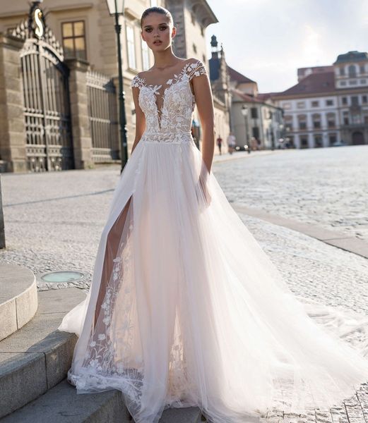 fashion a line lace beach wedding dresses sheer plunging neck beaded bridal gowns appliqued sweep train tulle robe de mariée, White
fashion a line lace beach wedding dresses sheer plunging neck beaded bridal gowns appliqued sweep train tulle robe de mariée, White