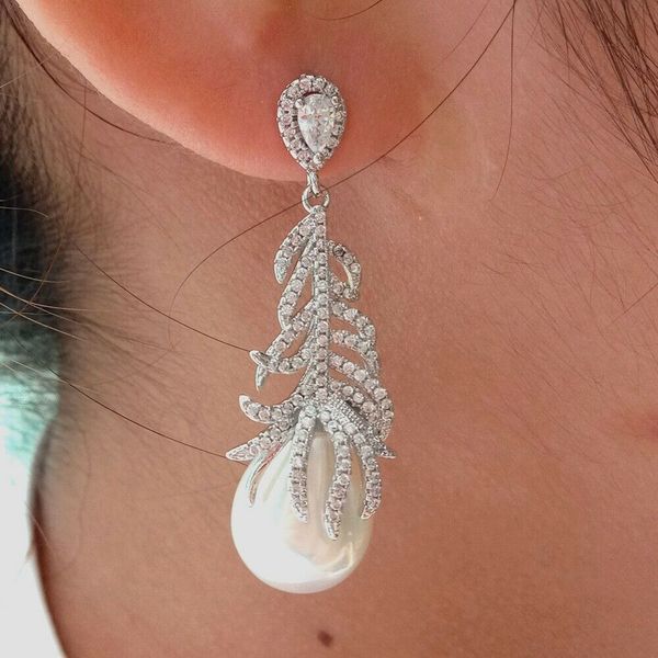 white sea shell pearl golden plated cz pave feather earrings, Silver 
white sea shell pearl golden plated cz pave feather earrings, Silver