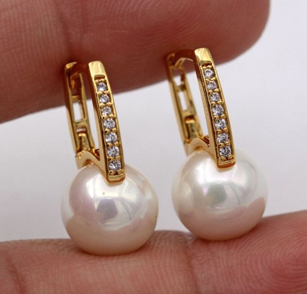 selling beautiful new 18k gold pearl earrings, european and american creative earrings and earrings, Golden;silver
selling beautiful new 18k gold pearl earrings, european and american creative earrings and earrings, Golden;silver