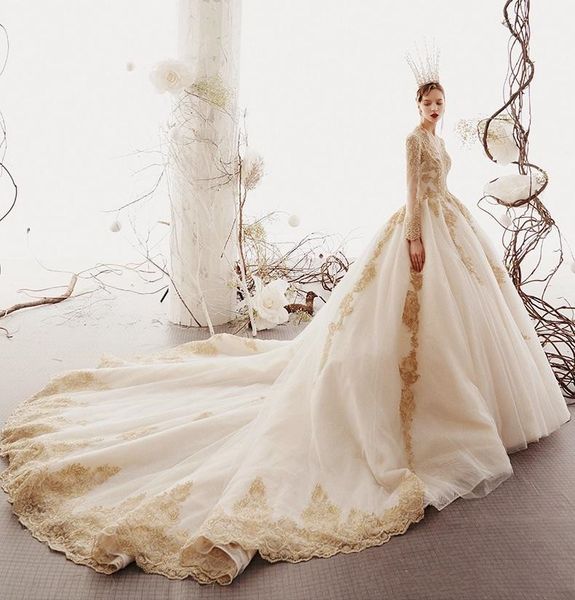 2020 new arrival long sleeves gold appliqued a-line wedding dresses dubai arabic luxury beaded v neck sweep train bridal gown, White
2020 new arrival long sleeves gold appliqued a-line wedding dresses dubai arabic luxury beaded v neck sweep train bridal gown, White