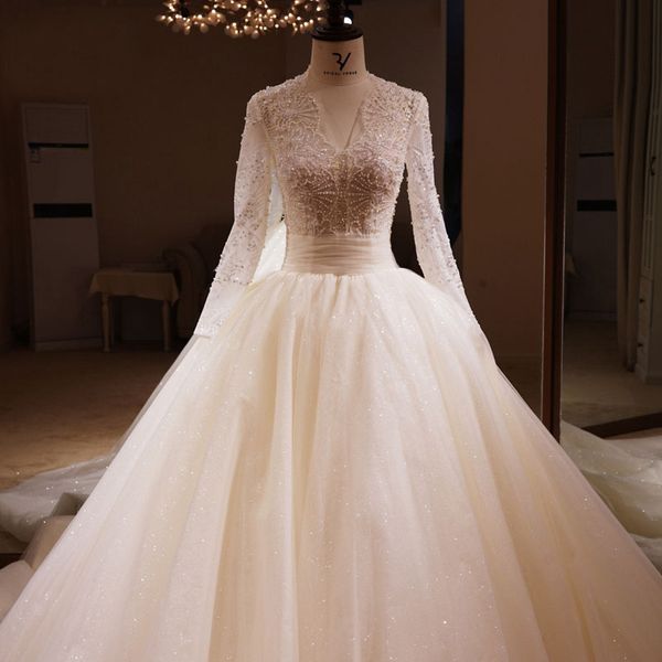 sparkly illusion neckline long sleeve wedding dresses lace applique crystals beading see through wedding dress with 1.5m train wedding gowns, White
sparkly illusion neckline long sleeve wedding dresses lace applique crystals beading see through wedding dress with 1.5m train wedding gowns, White