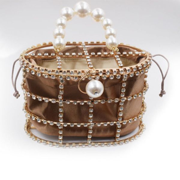 new arrival womens hand bag pearls handles beads birdcage shape hollow out evening bag
new arrival womens hand bag pearls handles beads birdcage shape hollow out evening bag