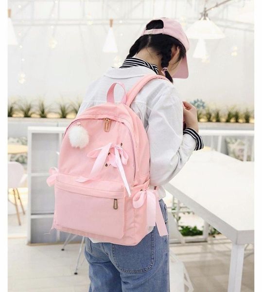 cross border new fashion korean double shoulder bag women's ribbon decoration solid color canvas backpack
cross border new fashion korean double shoulder bag women's ribbon decoration solid color canvas backpack