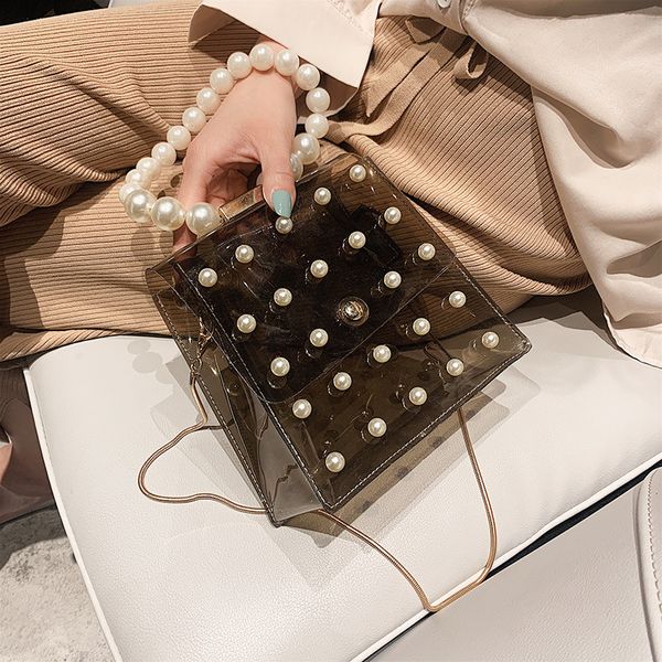 small bag women 2020 new handbag girl pearl handbag transparent jelly shoulder messenger bag chain
small bag women 2020 new handbag girl pearl handbag transparent jelly shoulder messenger bag chain