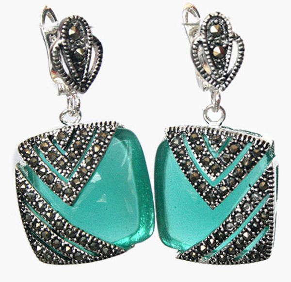 huarongkangyou natural green opal cat eye stone 925 silver marcasite bread earing big earrings
huarongkangyou natural green opal cat eye stone 925 silver marcasite bread earing big earrings