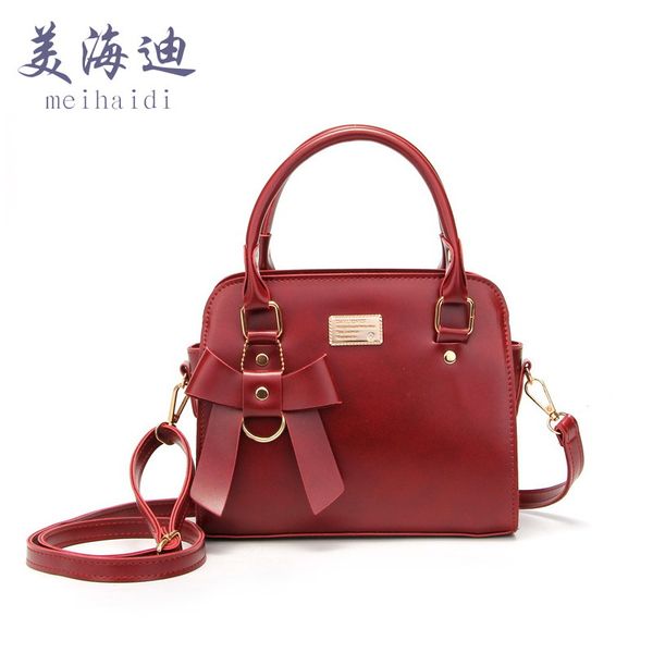 new style shoulder solid color square sling bag 
new style shoulder solid color square sling bag