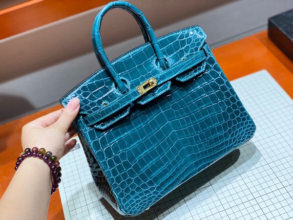 orginal crocodile skin 25cm blue brikin bag,fully handmade,wax thread,many colors with different size for chosen
orginal crocodile skin 25cm blue brikin bag,fully handmade,wax thread,many colors with different size for chosen