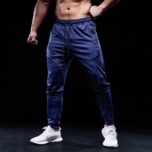 2020 selling men sports running pants with zipper pockets football soccer pants training sport jogging gym, Black;blue
2020 selling men sports running pants with zipper pockets football soccer pants training sport jogging gym, Black;blue