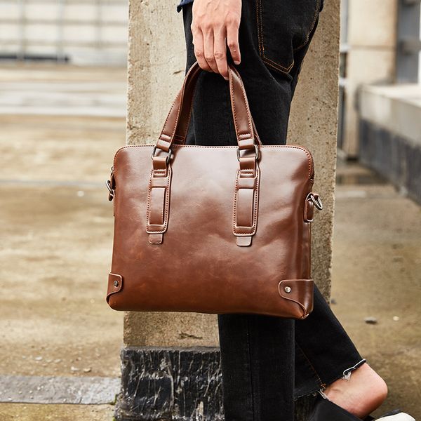 2020 vintage fashion women handbags casual shoulder messenger bags new design a4 briefcase men lapbag bolso hombre sac homme
2020 vintage fashion women handbags casual shoulder messenger bags new design a4 briefcase men lapbag bolso hombre sac homme