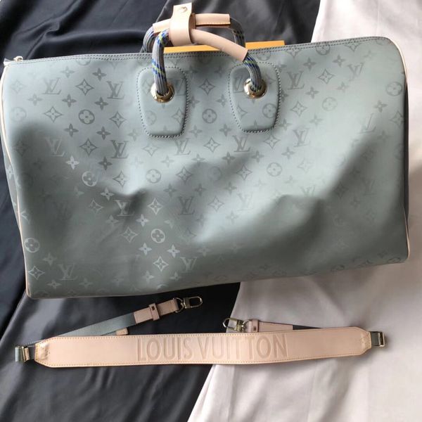 autumn winter fashion show men's travel bags speedy 50 real leather handbags real leather keepall 50 shoulder bag totes for man women
autumn winter fashion show men's travel bags speedy 50 real leather handbags real leather keepall 50 shoulder bag totes for man women