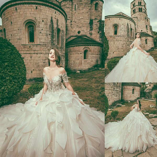 modest bohemian corona borealis ball gown wedding dresses short sleeve tulle lace pearls crystal wedding gowns sweep train robe de mariée, White
modest bohemian corona borealis ball gown wedding dresses short sleeve tulle lace pearls crystal wedding gowns sweep train robe de mariée, White