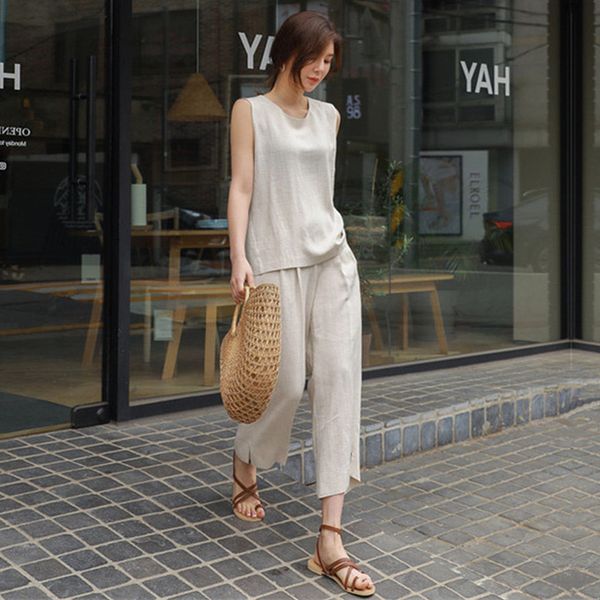 women's suit 2020 summer round neck slit vest vest + slit nine-leg wide-leg pants two-piece suit, White
women's suit 2020 summer round neck slit vest vest + slit nine-leg wide-leg pants two-piece suit, White