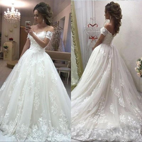 New Arrival Luxurious Ball Gown Wedding Dresses Off Shoulder Cap Sleeves Lace Appliques Sweep Train Plus Size Bridal Gowns
New Arrival Luxurious Ball Gown Wedding Dresses Off Shoulder Cap Sleeves Lace Appliques Sweep Train Plus Size Bridal Gowns